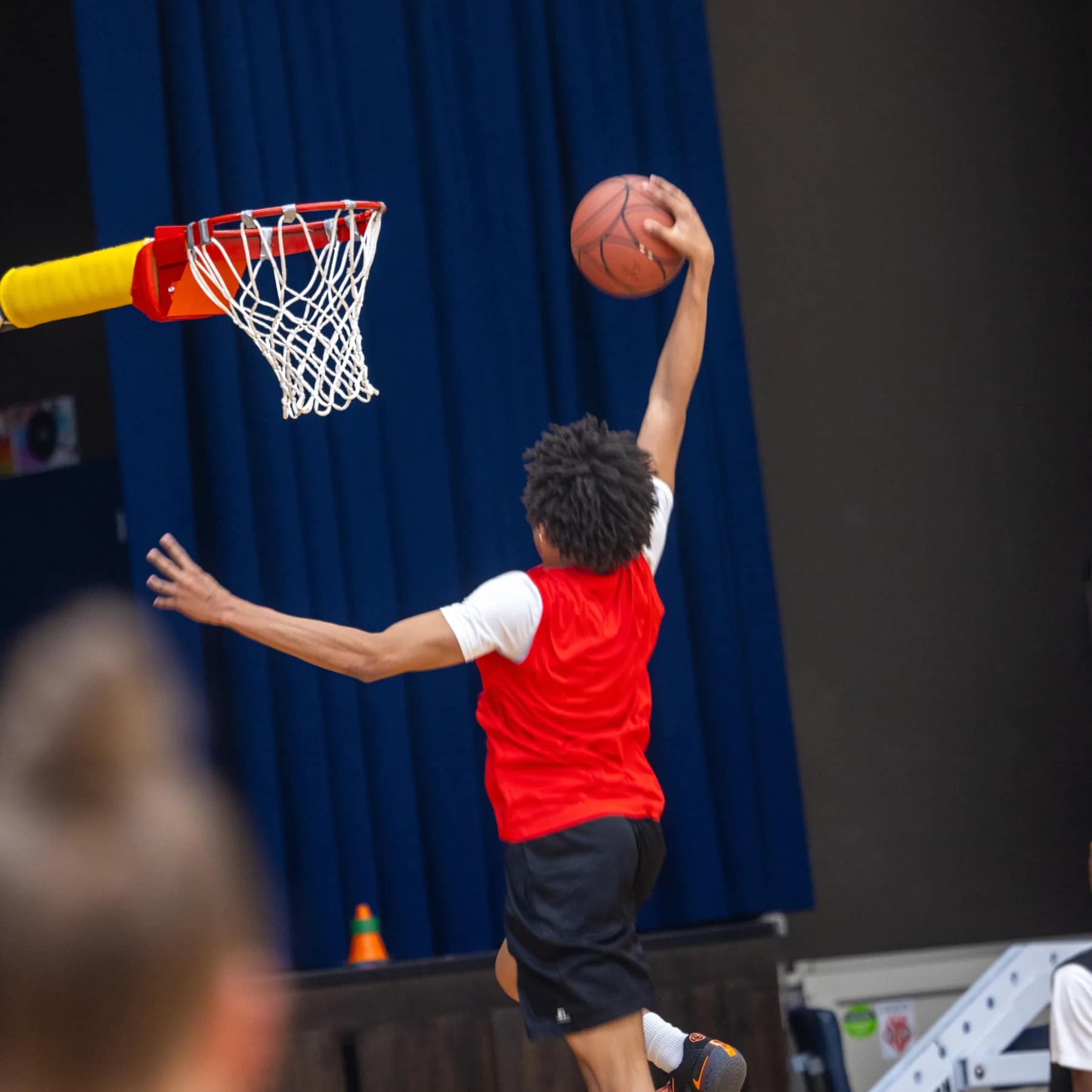 Player attacking the UHoop at the peak of a finish