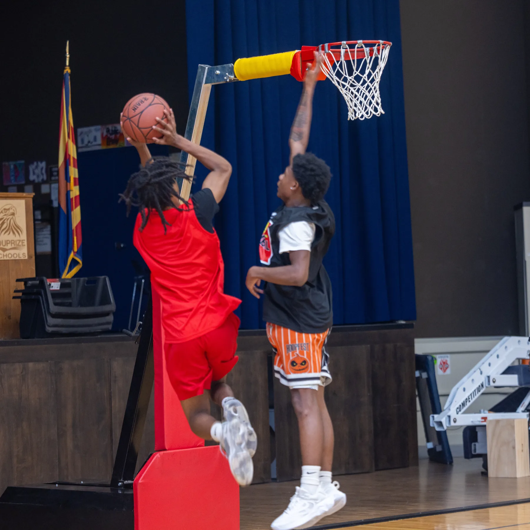 Athletes attacking the UHoop in No Backboard Basketball action